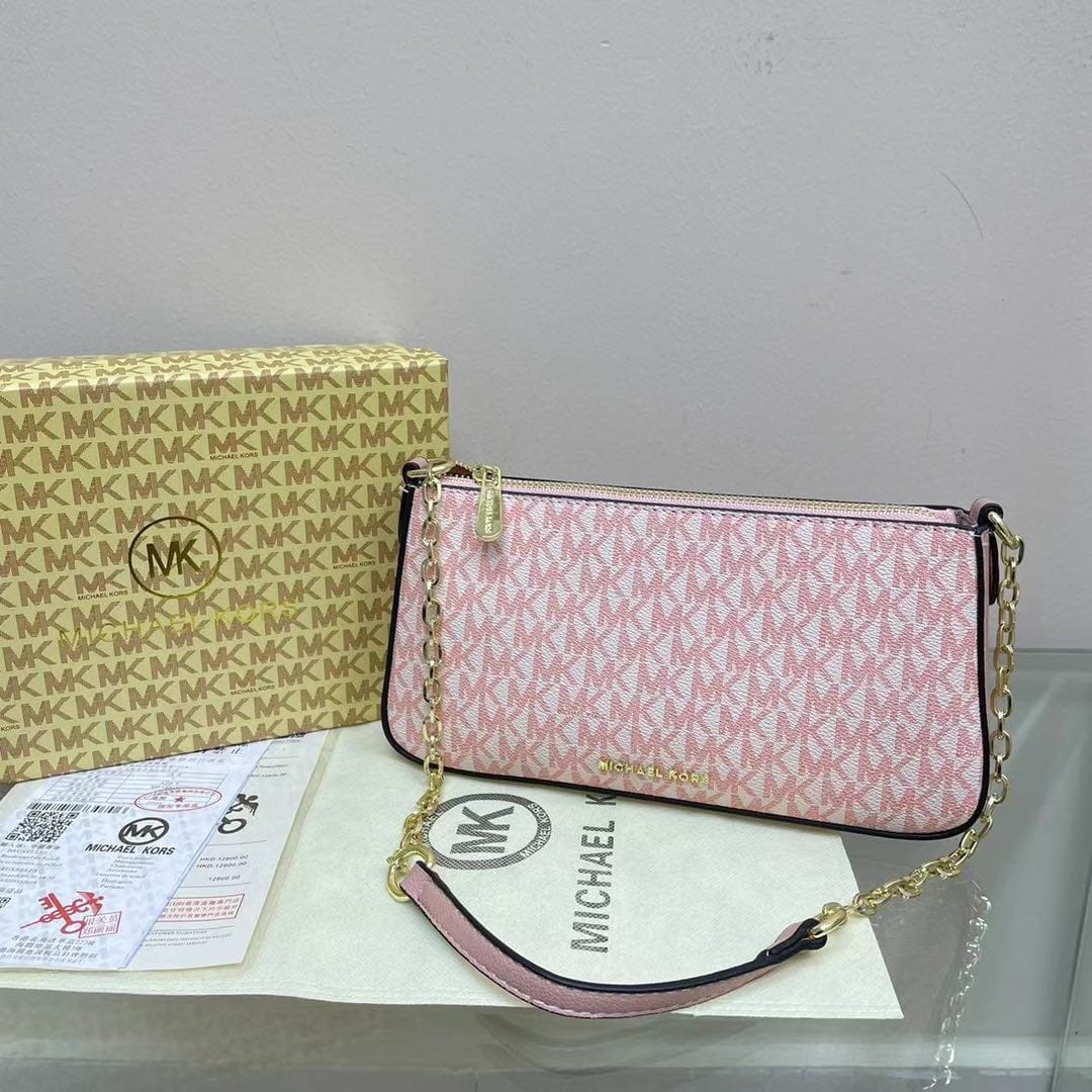 Michael Kors Jet Set Bag in Monogram Canvas